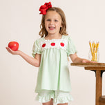young girl wears apple back to school outfit