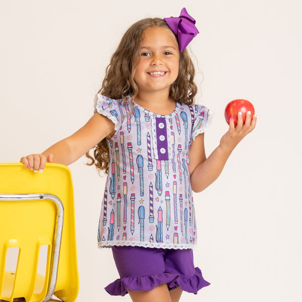 young girl wears back to school outfit