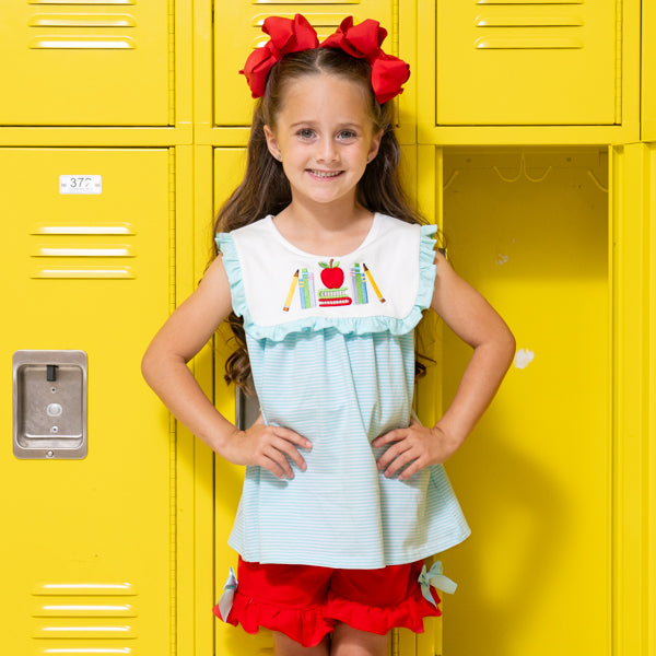 young girl wears back to school outfit