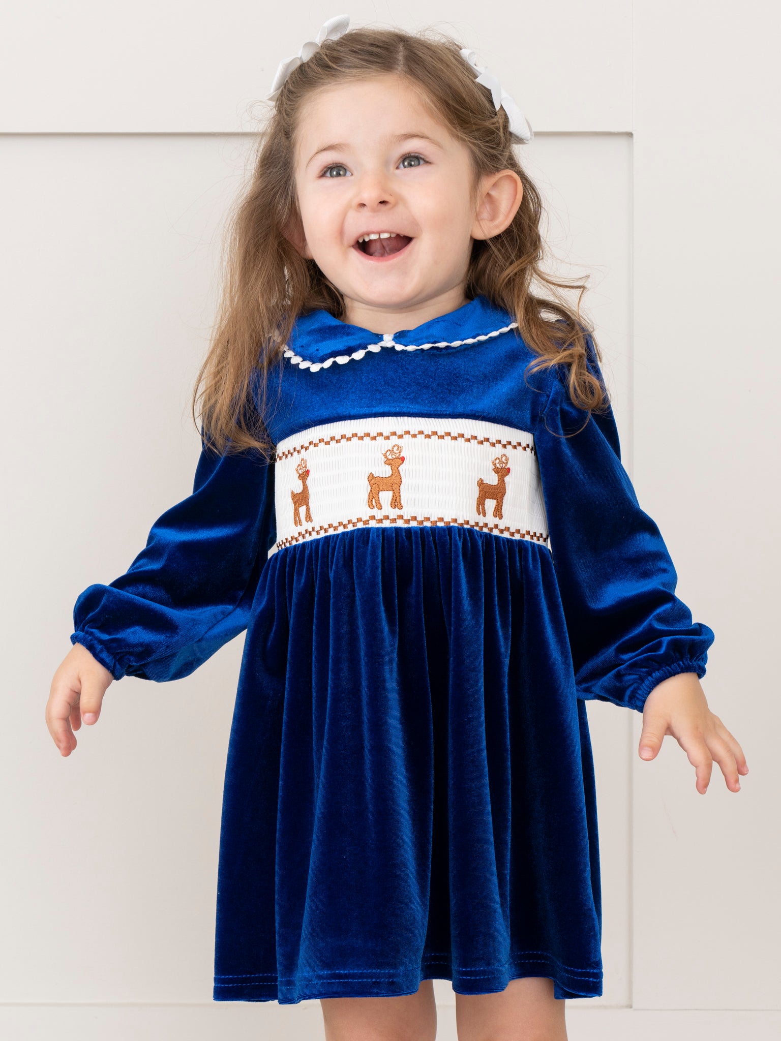 Royal Blue Smocked Reindeer Velvet Dress - Marie Nicole Clothing Royal Blue Smocked Reindeer Velvet Dress - Marie Nicole Clothing