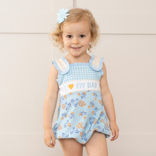 young girl wears I love dad romper with white background