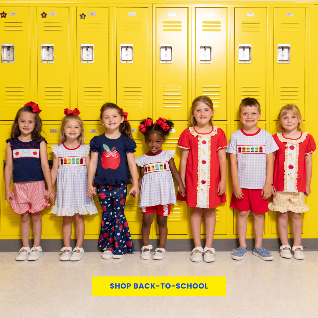 kids posed in front of lockers wearing back to school outfits