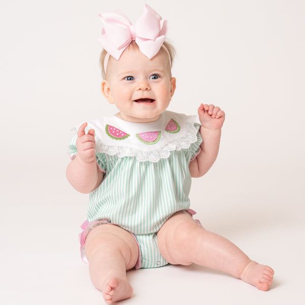baby wearing watermelon bubble romper