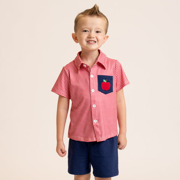 young boy wearing apple back to school outfit