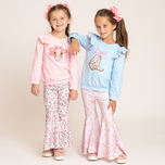 girls wearing fall cowgirl outfits