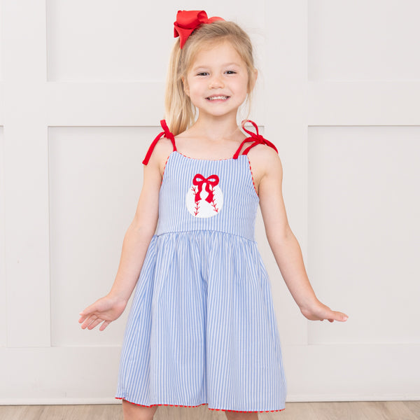 girl wearing baseball dress