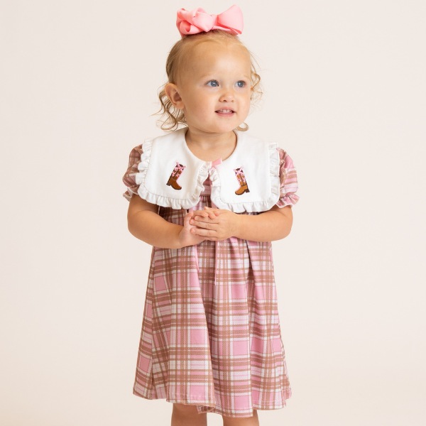 young girl wears cowgirl dress for fall