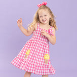 young girl wears gingham ice cream dress