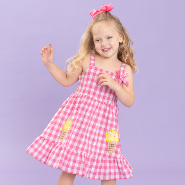 young girl wears gingham ice cream dress