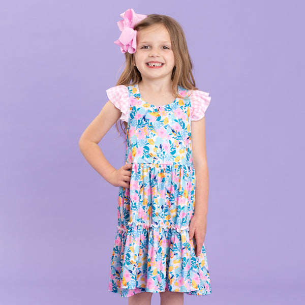young girl wears floral dress