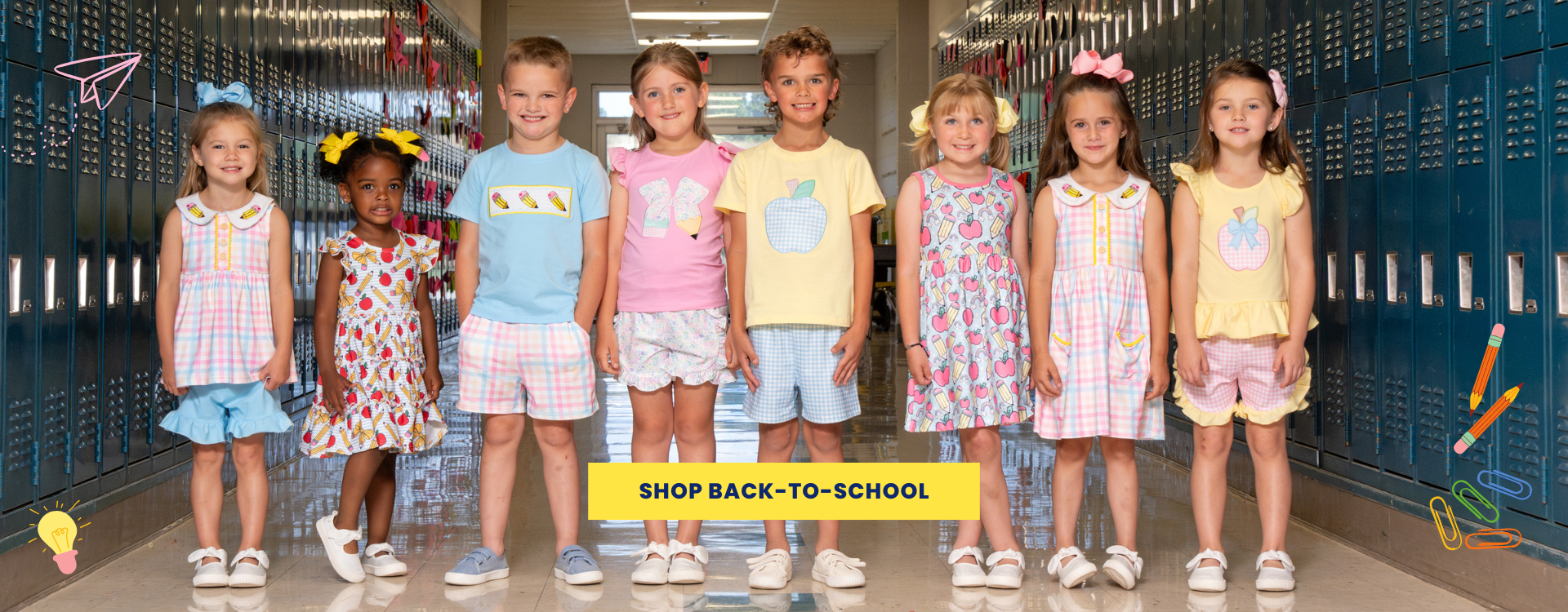 kids posed in front of lockers wearing back to school outfits
