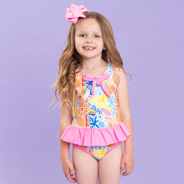 Girl wearing printed swimsuit