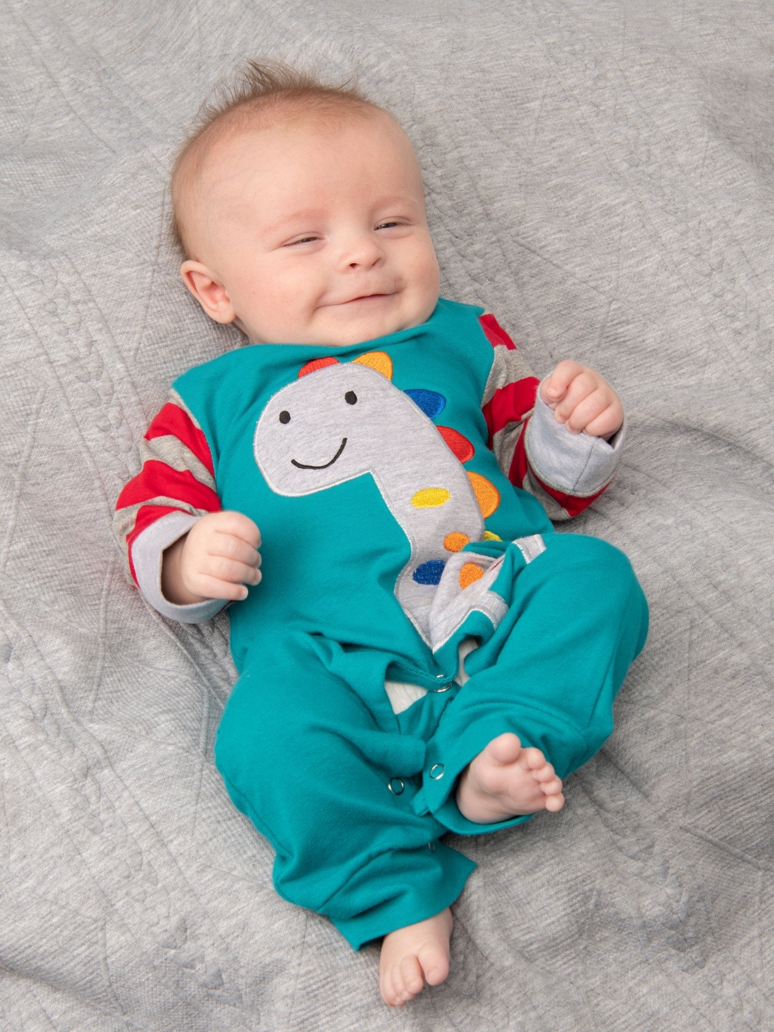 Blue Raglan Dinosaur Romper - Marie Nicole Clothing
