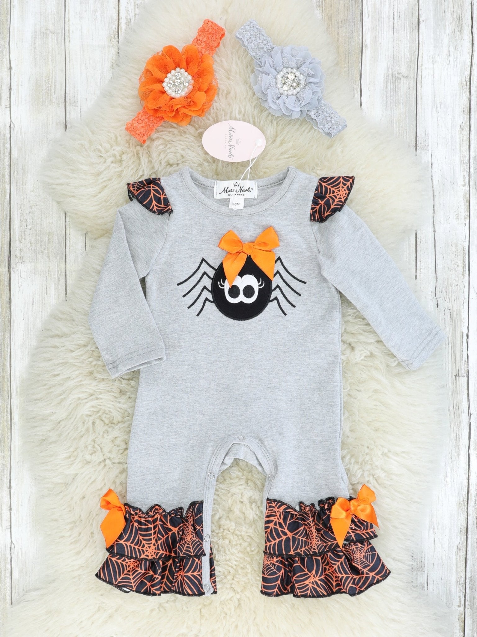 Orange & Black Spider Web Ruffle Romper - Marie Nicole Clothing